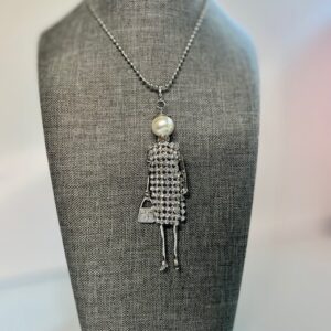 Handcrafted Silver Doll Necklace - Exquisite Craftsmanship, Sustainable Materials, and the Perfect Gift for Any Occasion!